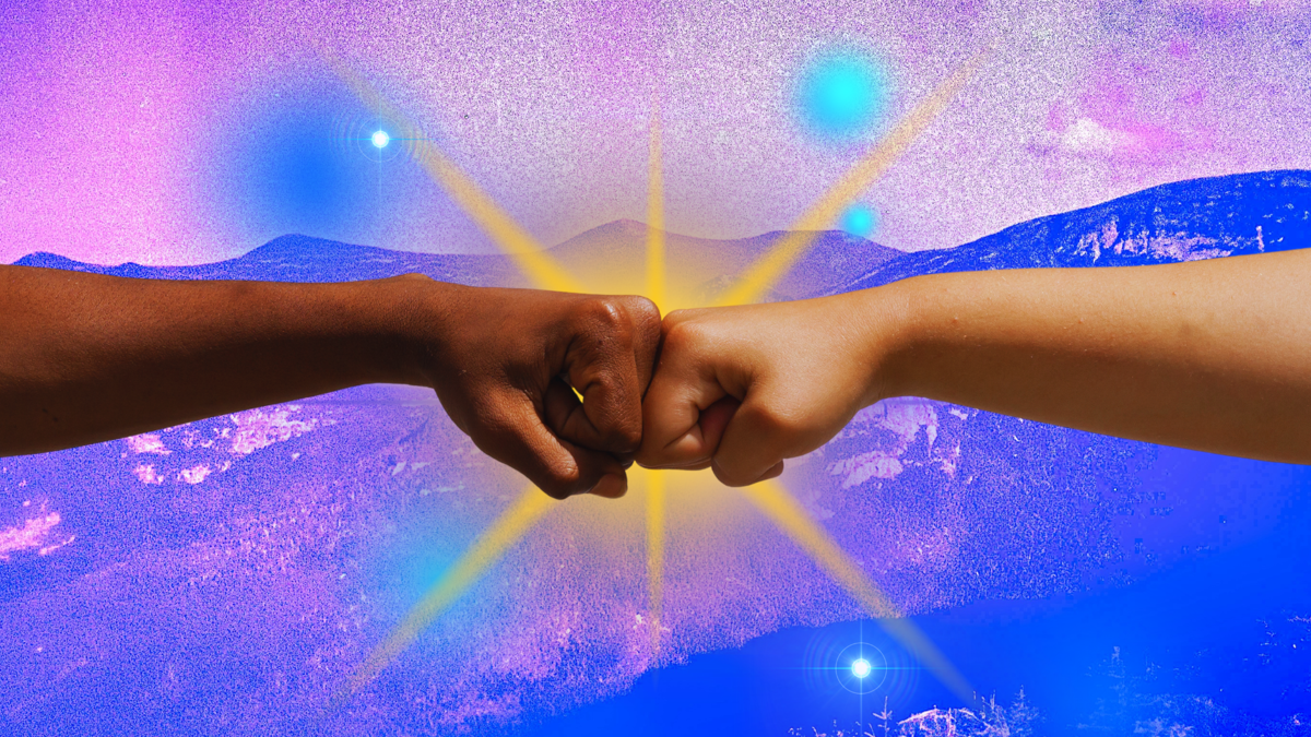 An image of a fist pump to indicate team work.